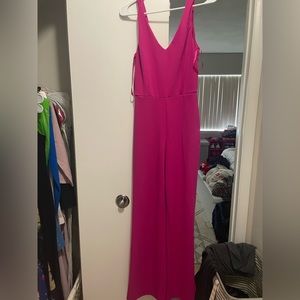 Hot pink v neck jumpsuit size small WITH POCKETS!